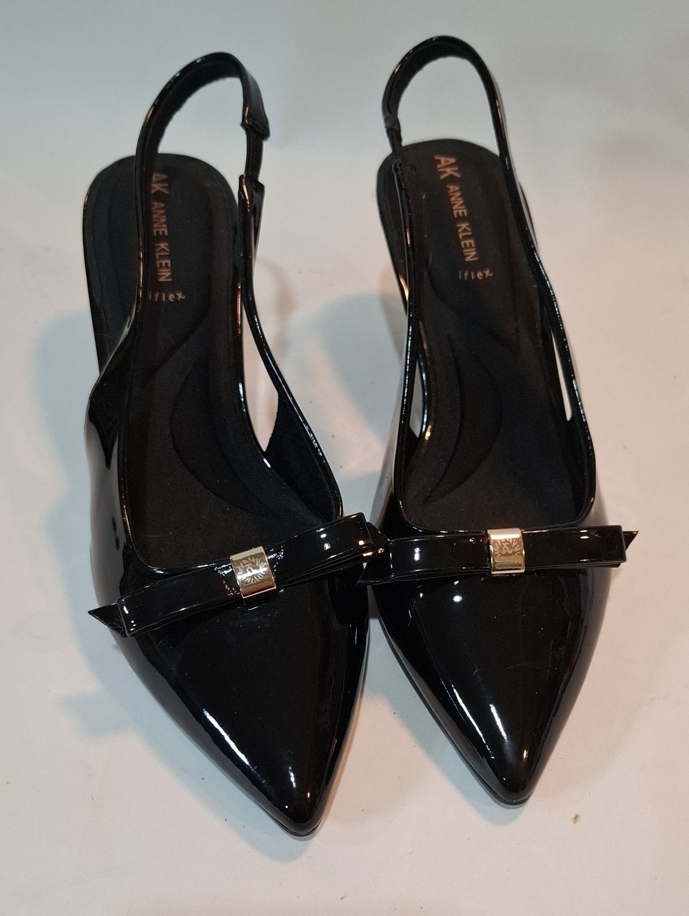 Anne Klein Black Patent Pointed Slingback Flats with Bow and Gold Accent